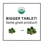 Organic chlorella and spirulina tablets close up texture