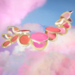 Too Faced flower extract infused smoothing face blush swatched on skin
