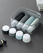The clear airport compliant makeup bag filled with all eight pieces of the Mrsdry silicone travel set showing the coordinated color scheme.