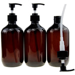 Three pack amber refillable travel containers with black pumps and labels