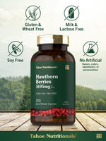 Close up of Tahoe Nutritionals quick release hawthorn berry capsules next to the bottle