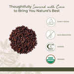 A fresh cup of hot herbal tea brewed using whole dried hawthorn berry fruits.