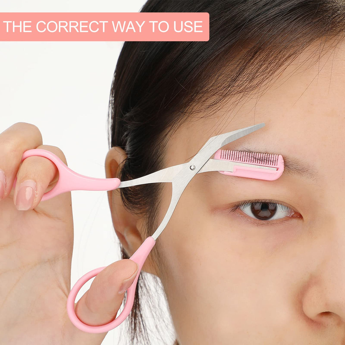 Close up of eyebrow scissors comb attachment for precision