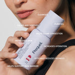 Prequel Universal Skin Solution held in hand for scale