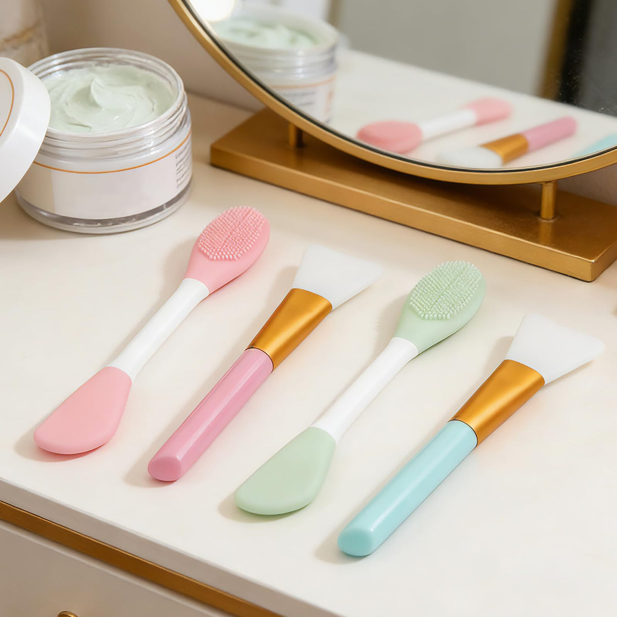 Complete packaging of the double ended facial mud spatula and cleanser collection.