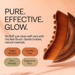 Side profile of the Aeki facial brush demonstrating how the curved design fits the jawline and chin seamlessly