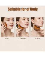Kojeva facial dry brush being held to demonstrate the comfortable grip of the compact ergonomic handle.