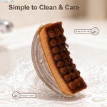 Top view of the natural bristle lymphatic contour brush highlighting the premium texture and build quality.