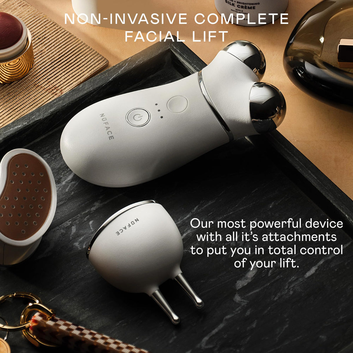 NuFACE premium anti aging kit demonstrating how to lift brows and contour cheekbones with microcurrent spheres.