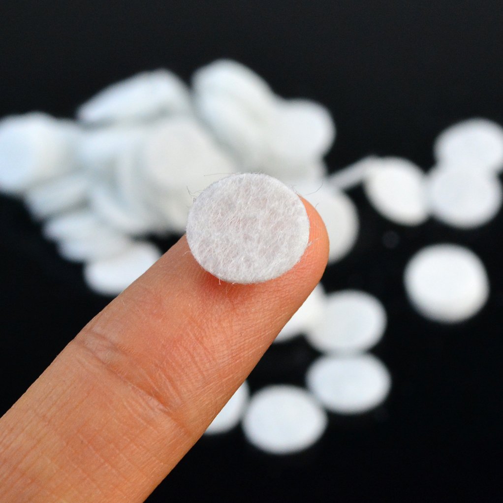 Close up of 10mm circular facial vacuum replacement sponge filters
