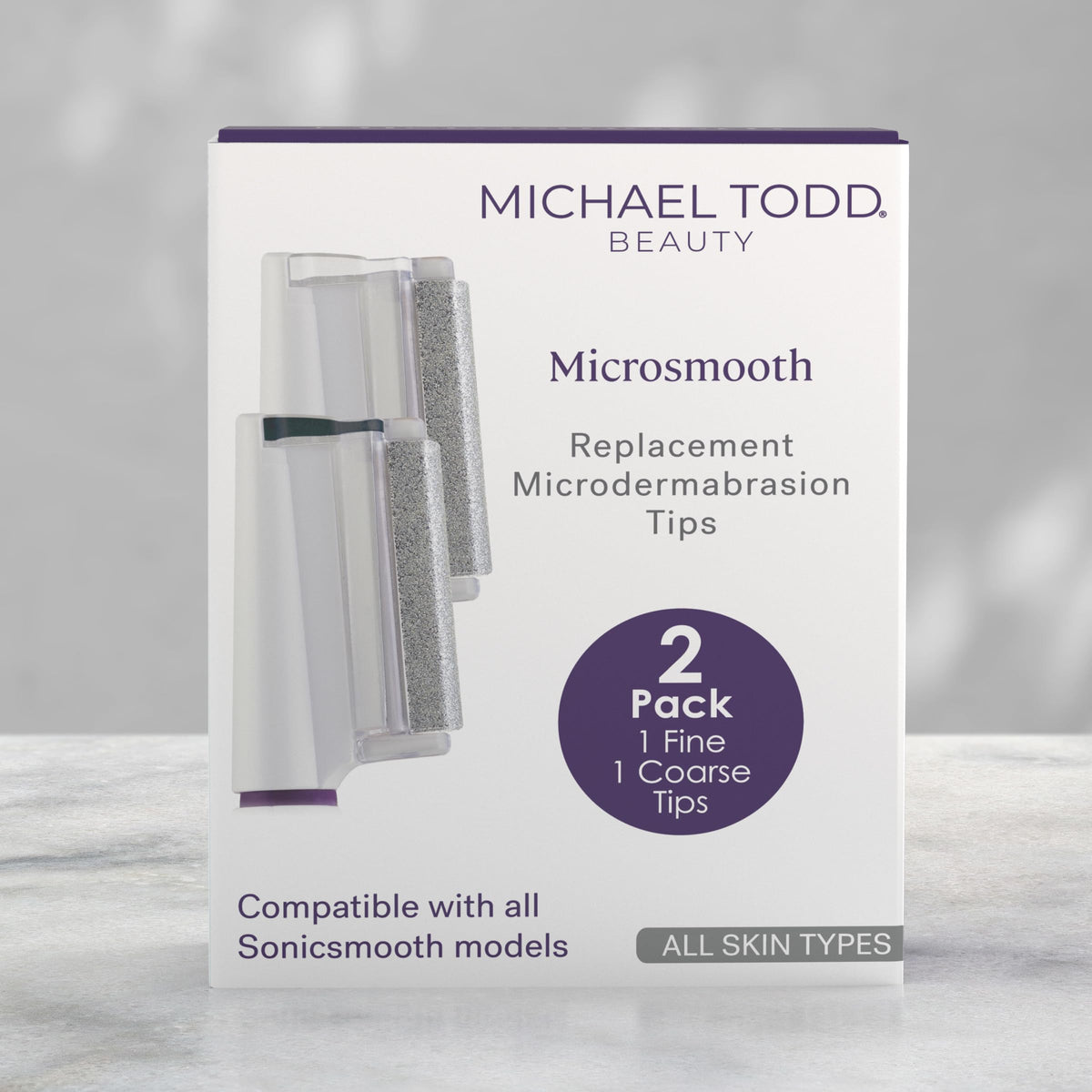 Michael Todd Beauty replacement tips positioned next to a compatible sonic skincare handle.
