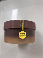 Applying Neogen Real Polish honey scrub to damp skin