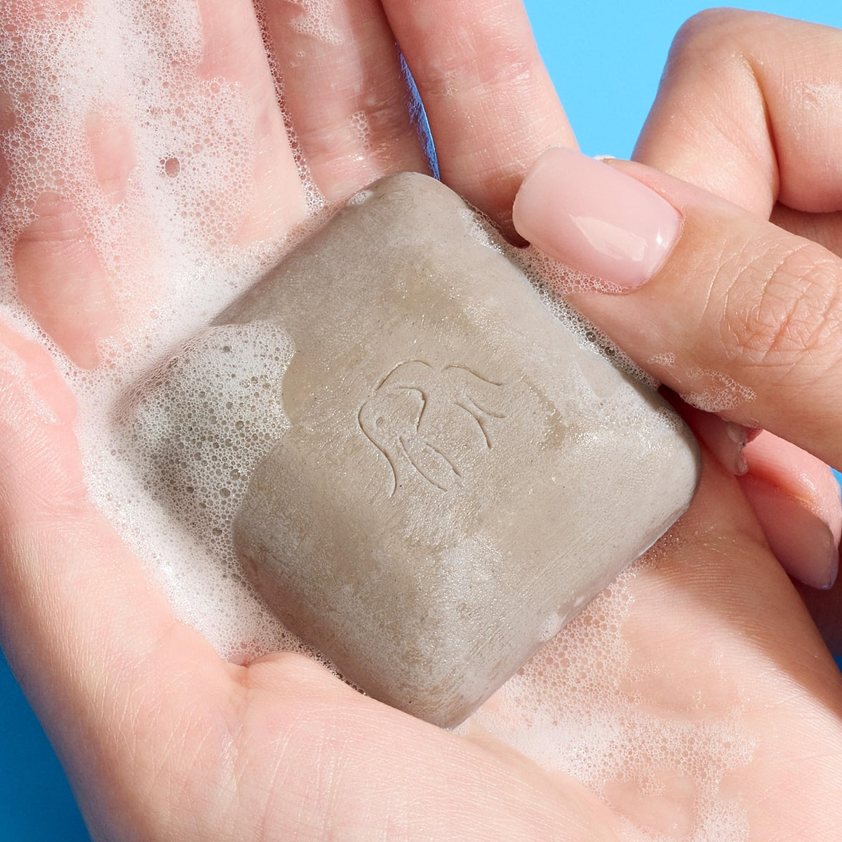 Drunk Elephant soap free exfoliating face wash bar showing authentic product packaging
