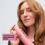 Eva NYC volumizing hair spray bottle displaying ingredients and lavender scent profile