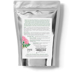 Elanen Naturals valerian root product packaging alongside a freshly brewed warm cup of herbal tea.