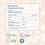 BodyBio Balance Oil dietary supplement softgels scattered next to the packaging