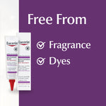 Applying Eucerin spot treatment to dry elbow