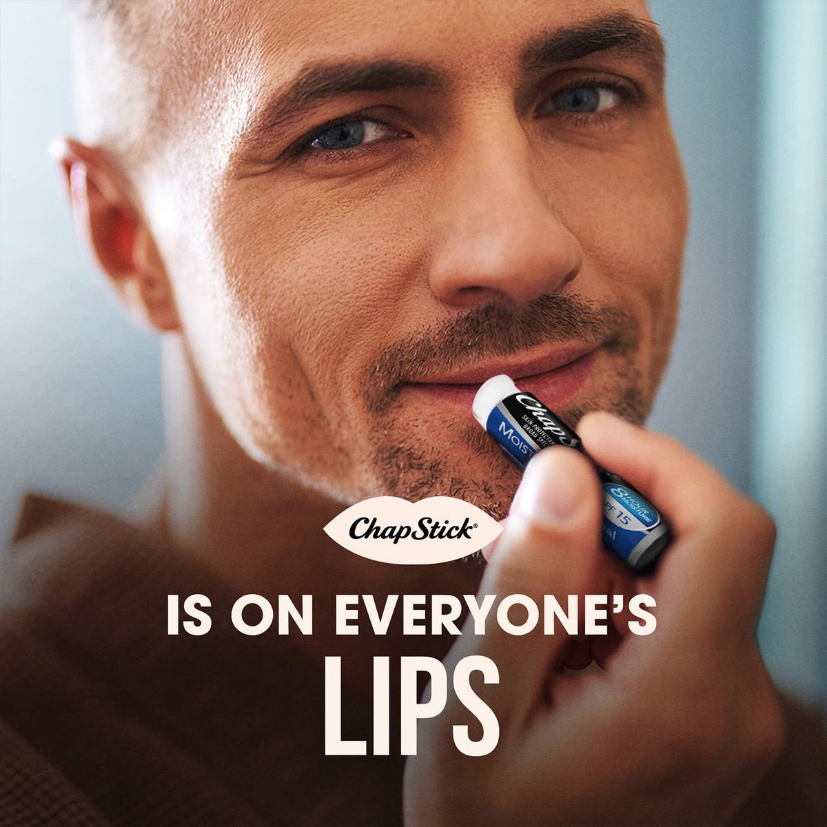 Full collection of twelve ChapStick Original SPF 15 lip care sticks unboxed.