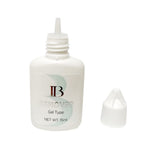 Professional eyelash extension remover bottle with security seal close up view.