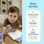JoySpring Genius Drops kids brain supplement bottle displayed next to fresh peppermint and herbal ingredients
