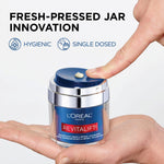 Side view of L'Oreal Paris Revitalift pressed night moisturizer box showing ingredients
