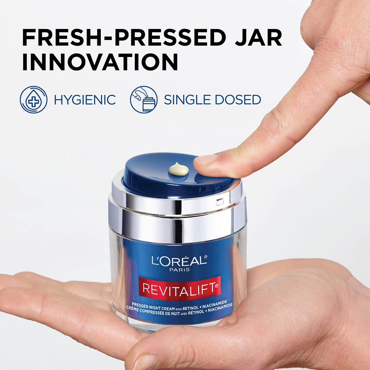 Side view of L'Oreal Paris Revitalift pressed night moisturizer box showing ingredients