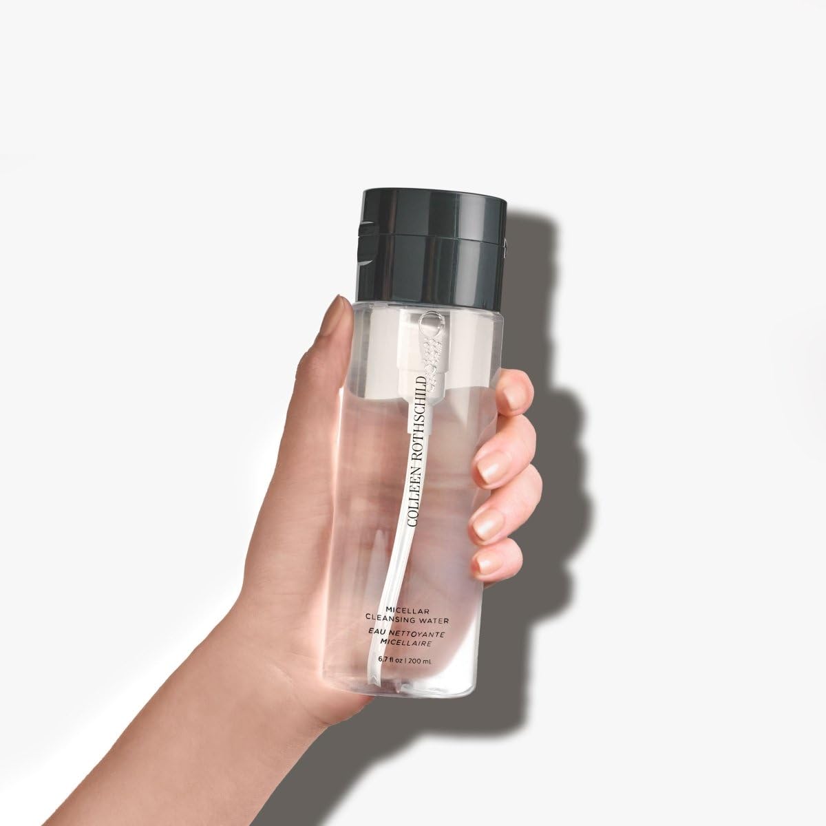 Premium Colleen Rothschild makeup remover being applied to a cotton pad for skincare routines.