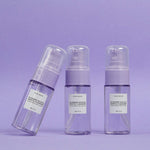 Side profile of Glow Recipe 30ml transparent bottle revealing the purple hued gel cleanser inside