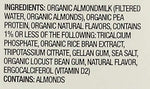 Pouring organic vanilla almond milk into breakfast cereal bowl
