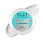 Pond's Light Moisturiser jar angle view