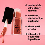 Close up of the non sticky formula texture of the e.l.f. deep berry lip gloss.