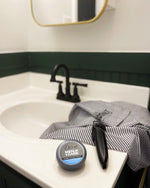 Texture detail of the fast absorbing non greasy Dove Men Care moisturizer cream.