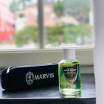 Marvis Strong Mint concentrated peppermint oral rinse with decorative tin container