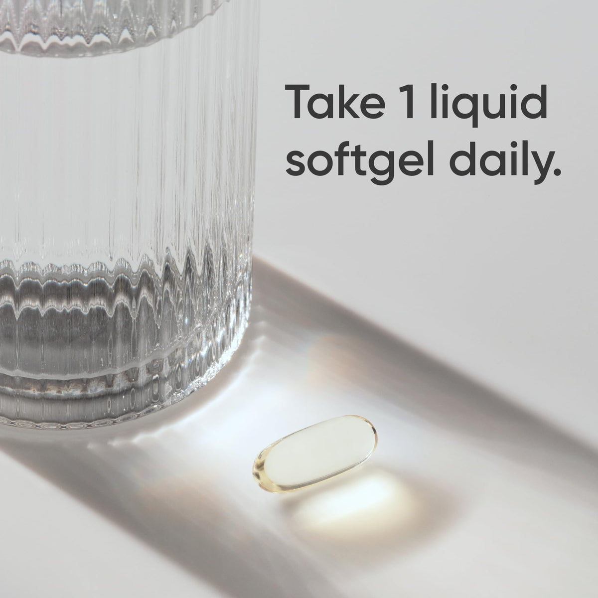 Sports Research premium fish oil liquid softgel capsules showing clear golden color and durable pescatarian gelatin shell