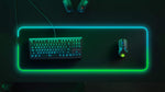 SteelSeries extra large desktop mouse pad with keyboard and mouse arranged on the micro-woven surface