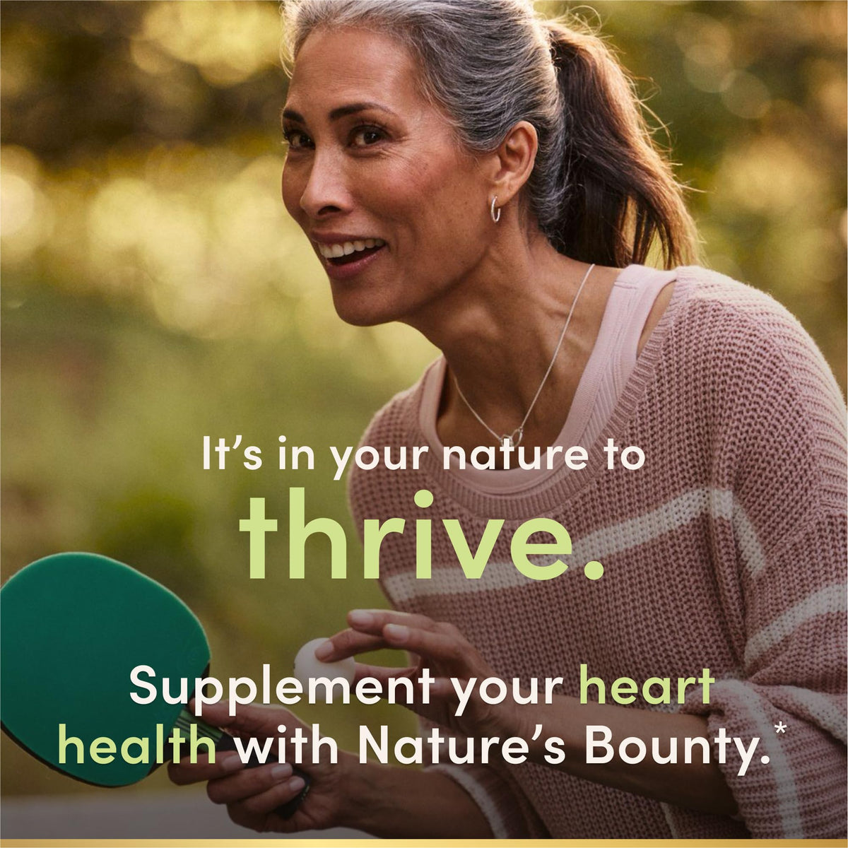 Authentic USA imported Nature's Bounty mini fish oil container angled view.