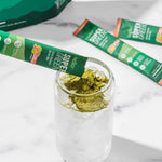 Nello Supergreens Mango Peach drink mixed in glass