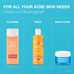 Rich foaming lather body exfoliator scrub bottle designed for sensitive and acne-prone skin types.