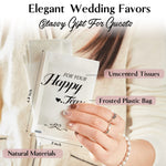 Bulk collection of fifty individual pocket tissue packs for wedding guests hospitality.