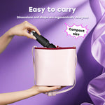 SGWGSMD mini multi frequency massager held in palm showing compact size