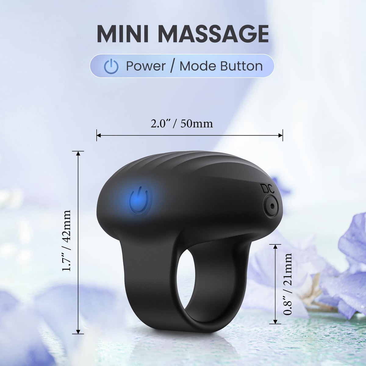 Compact travel friendly personal massager being worn on a finger for targeted therapy.