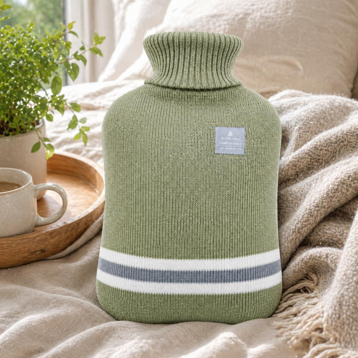 Soft gray striped hot water pack placed on feet providing cozy warmth during cold nights.