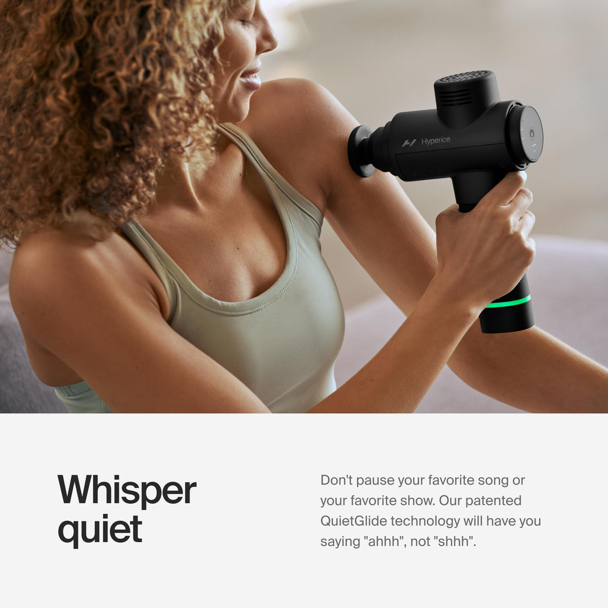 Side profile of premium black Hyperice Hypervolt 2 percussion massager displaying speed indicator lights.