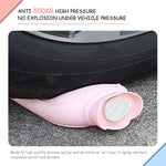 Small 350ml Redify hot water bottle held in hand for size reference