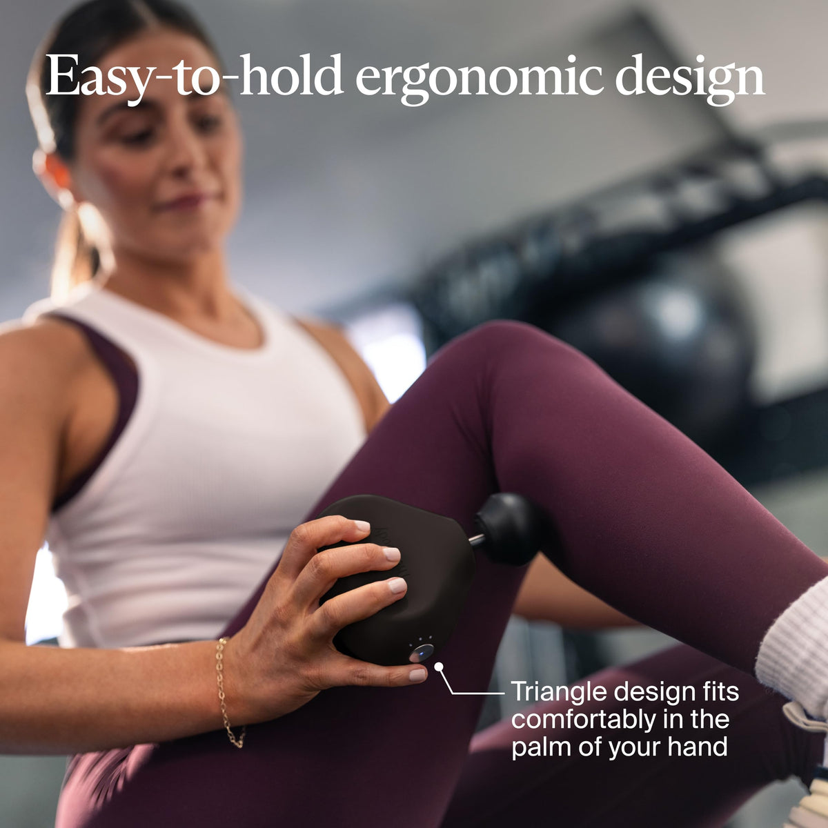 TheraGun Mini 3rd Generation handheld massager in ergonomic grip style