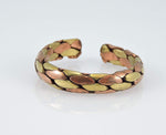 Adjustable three metal ring showing copper brass and silver bands