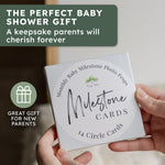 Close up view of authentic Tiny Trees milestone cards for monthly infant photography.