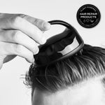Black Zenagen anti dandruff shower massager being held in a palm for grip demonstration