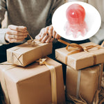 Bruislard compact scalp massager tool being held to demonstrate ergonomic grip