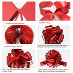 Zonon giant celebration pull bow laid out flat showing the simple inner ribbon assembly tabs.